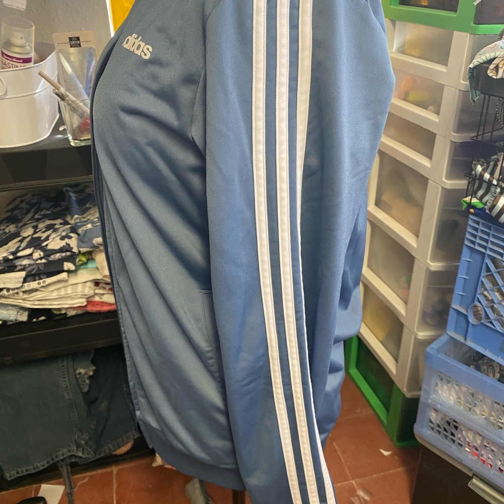 Adidas jacket size medium very pretty blue color